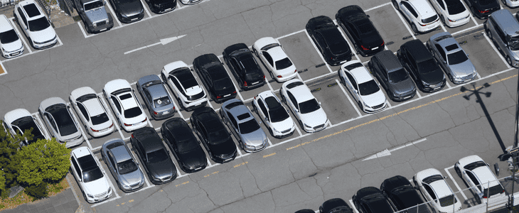 An aerial view of an offsite parking lot